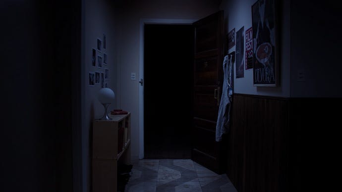 A live-action scene from 8-bit horror game Tenebris Somnia, showing a sinister figure in a darkened doorway