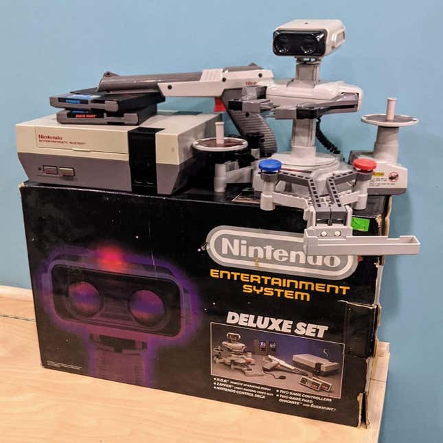 A NES deluxe set with original box and ROB the Robot.