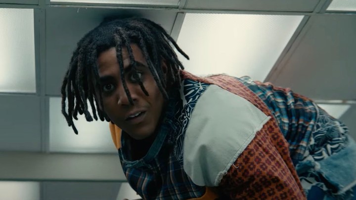 Jharrel Jerome as Cootie in a scene from I'm a Virgo on Amazon Prime, bending down to avoid hitting a ceiling.
