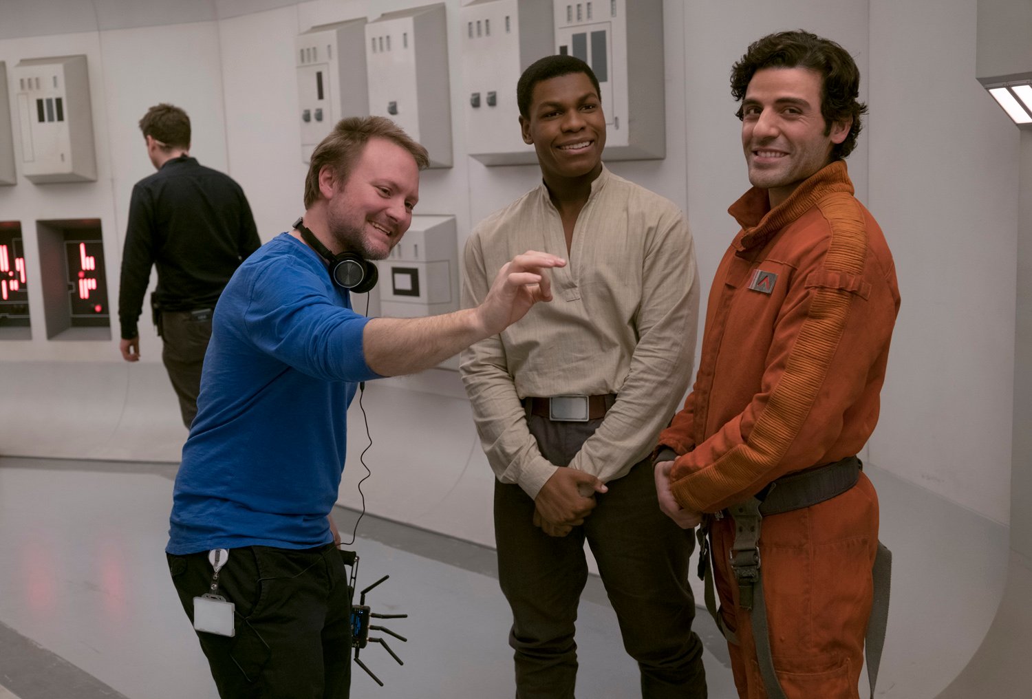 Rian Johnson, John Boyega, and Oscar Isaac on the set of Star Wars: The Last Jedi