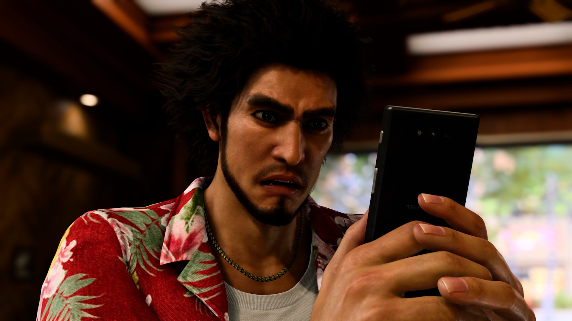 Like a Dragon Infinite Wealth screenshot Ichiban is checking his phone